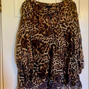 Leopard print tunic style top with lace up v neck